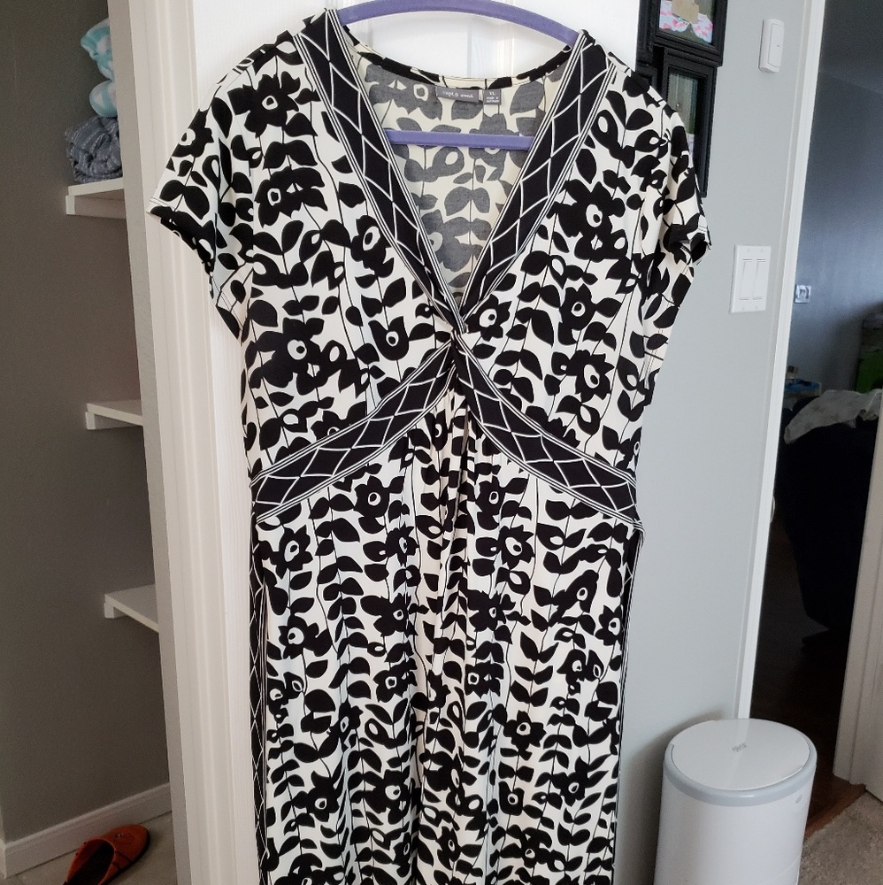 Cream, black dress